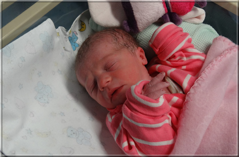 Mia aged about three hours old